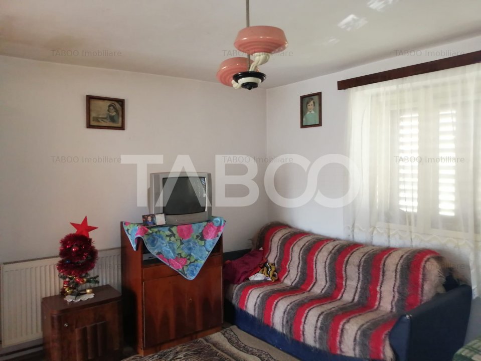 Casa individuala cu 3 camere si 800 mp teren de vanzare Rusi Sibiu