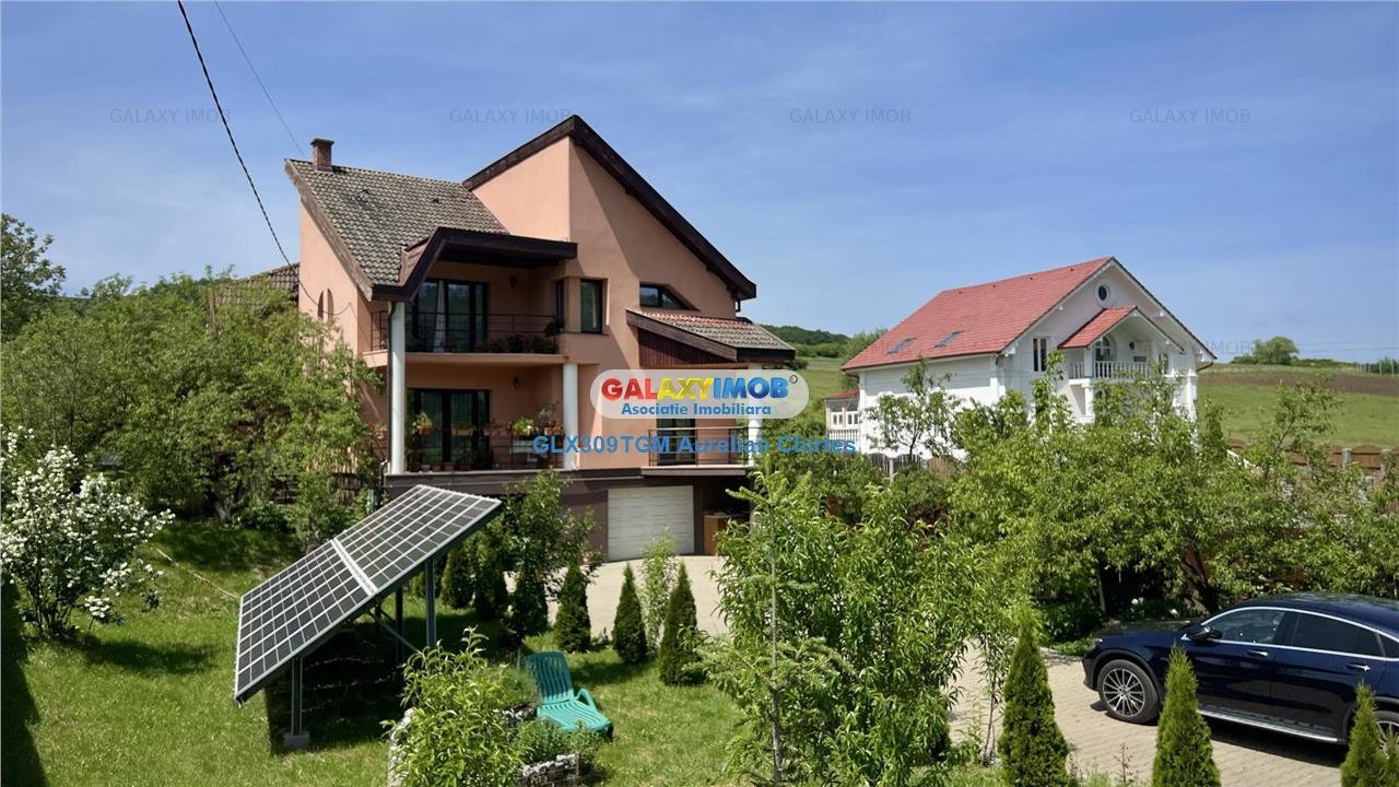 Vand casa cu 7 cam, 3 bai, si teren 3800 mp in Voiniceni