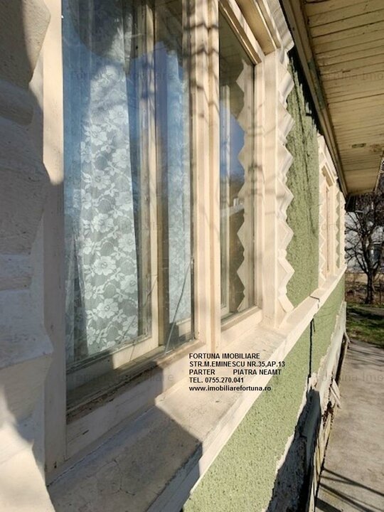 Casa batraneasca si teren