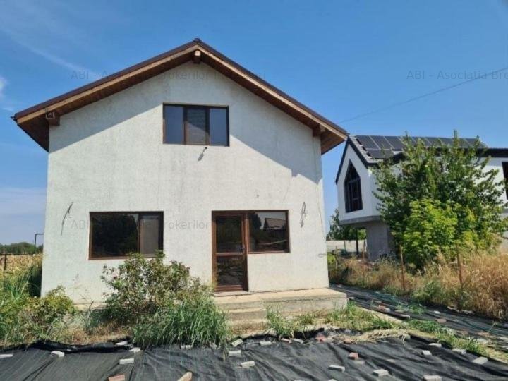 Casa individuala din lemn P M   teren 1.000 mp