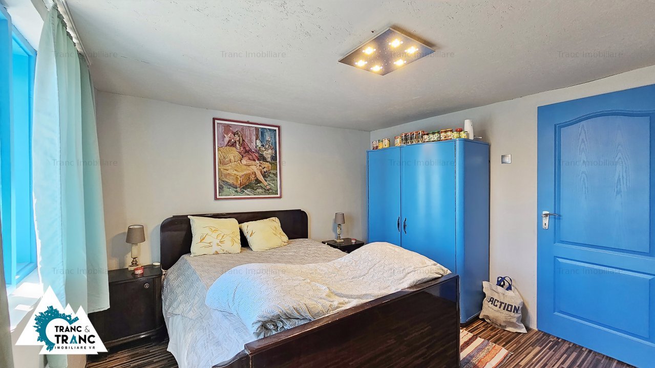 Casa traditionala cu 2 camere, partial renovata, in Frumuseni