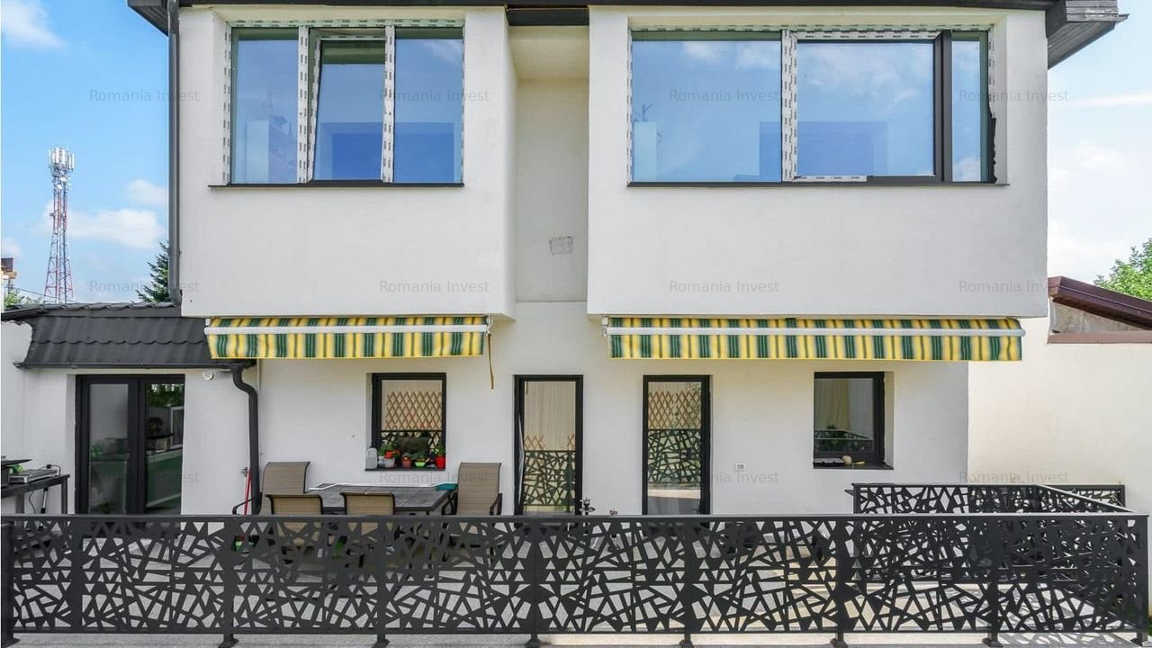 Apartament 5 camere cu terasă şi curte generoasă