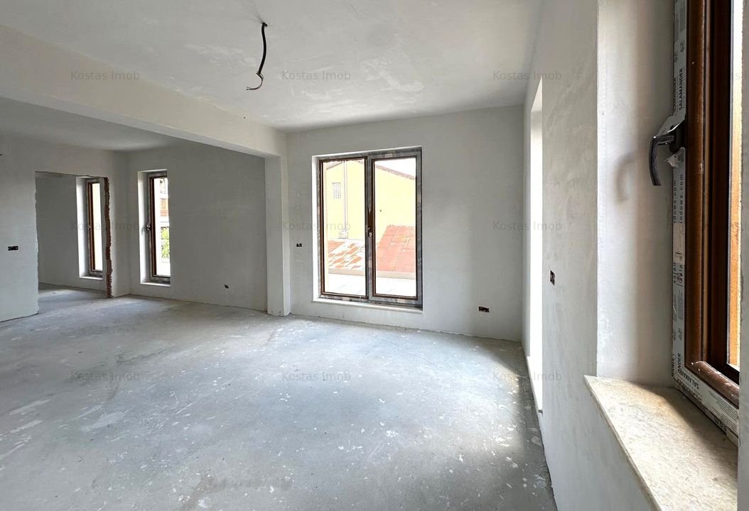 Vanzare imobil nou cu 4 apartamente pretabil inchiriere sau spatii de birouri