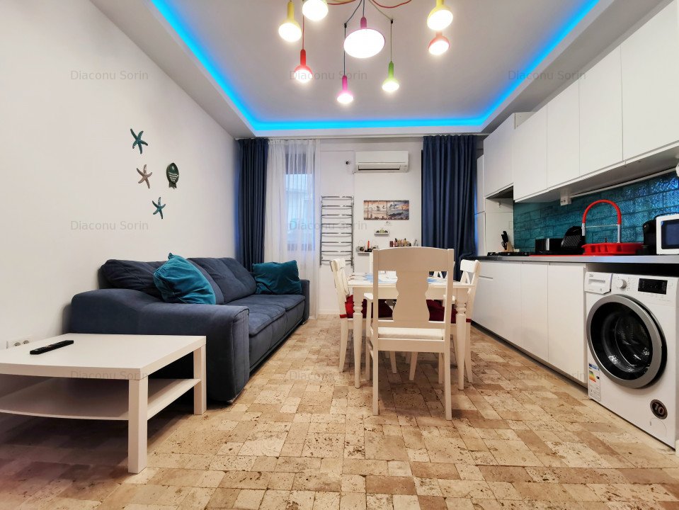 Apartament amenajat modern in randul 1 la mare