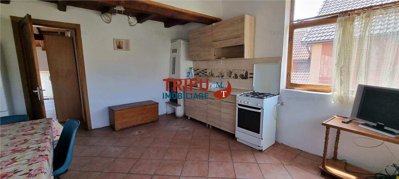 Apartament +garsoniera + teren de  180 mp la vila