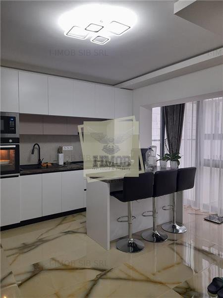 Casa mobilata cu 4 camere 2  bai si gradina in Cristian