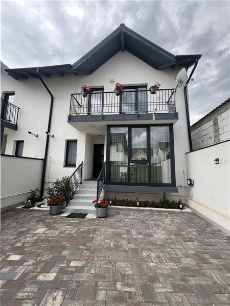Casa cu 4 camere 2 bai 2 terase si teren 204 mp in Cristian
