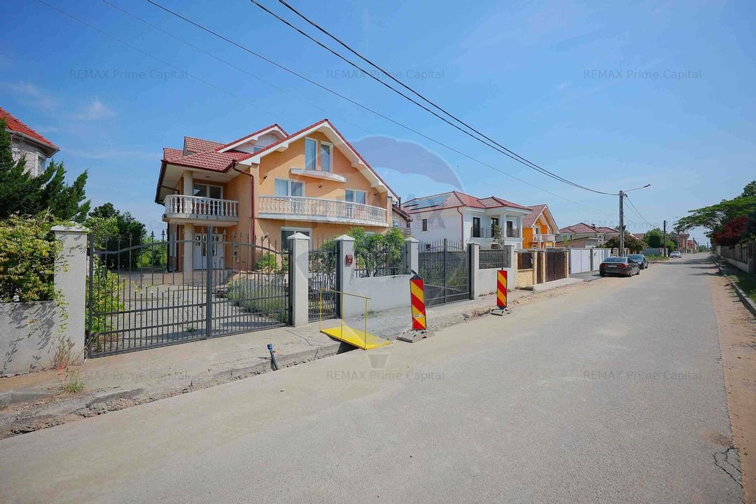 Casa cu 6 camere si 1000mp teren de vanzare in Sanmartin