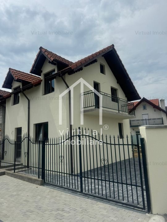 Casa individuala de vanzare cu 3 camere, 2 bai, curte- zona  Talmaciu