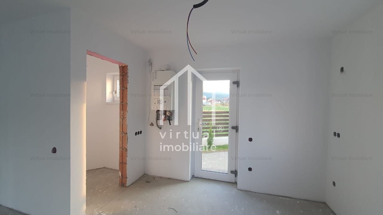 Casa individuala de vanzare cu 3 camere, 2 bai, curte- zona  Talmaciu