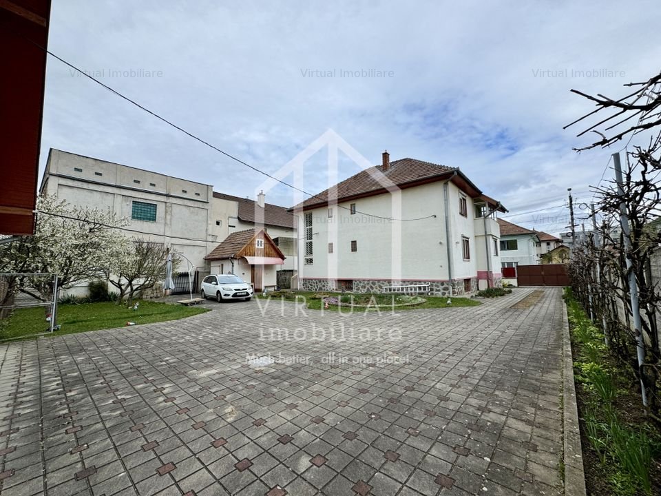 Casa individuala cu 6 camere + demisol 94mp utili, teren 972mp, garaje