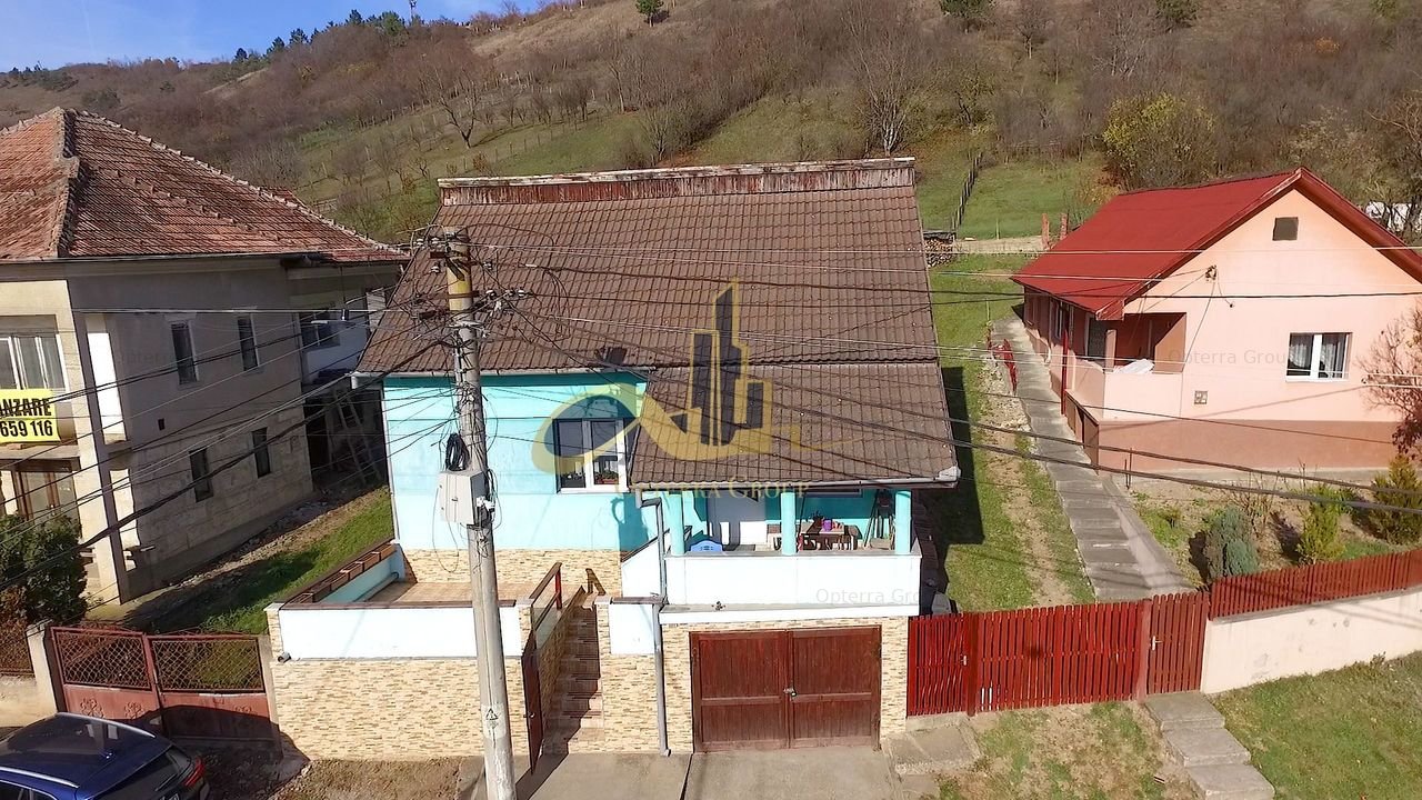Casa individuala 4 camere, teren 1100 mp, de vanzare in Loc . Suceagu