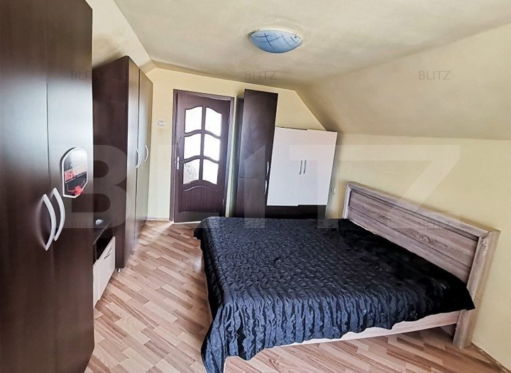 Casa cu 4 camere si curte cu 2 locuri de parcare, zona Marasti